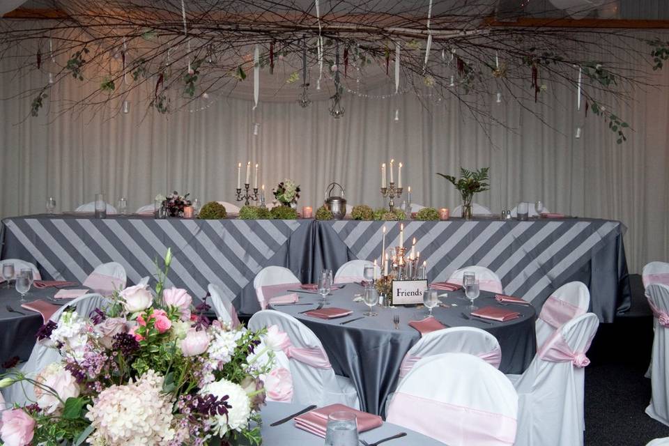 Decorated Wedding Head Table at Pine Peaks Event Center a member of Wedding Wire, The Knot, Brainerd Wedding Association, Twin Cities Bridal Show.  Photo by Kelli Engstrom Photography