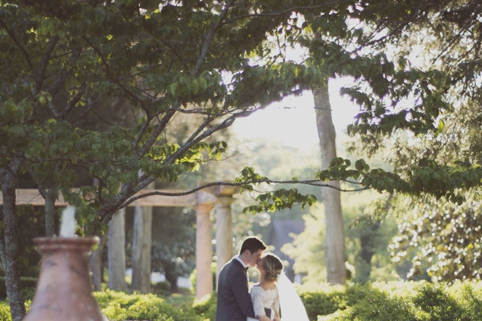 Newlyweds by the garden