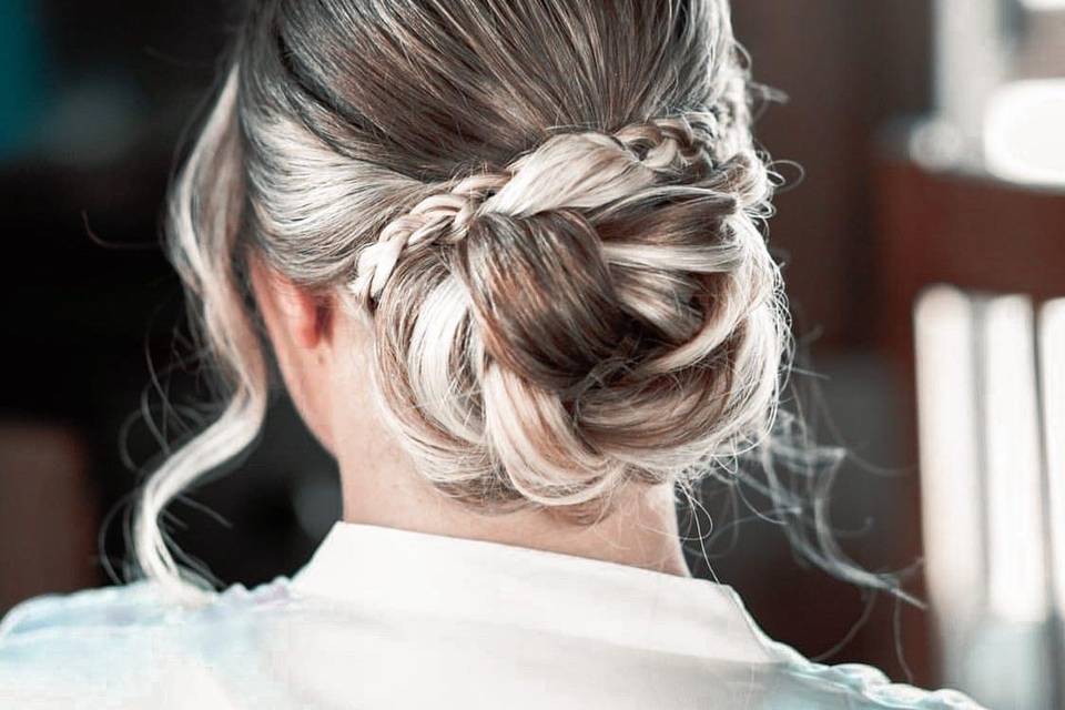 Low bun with a braid