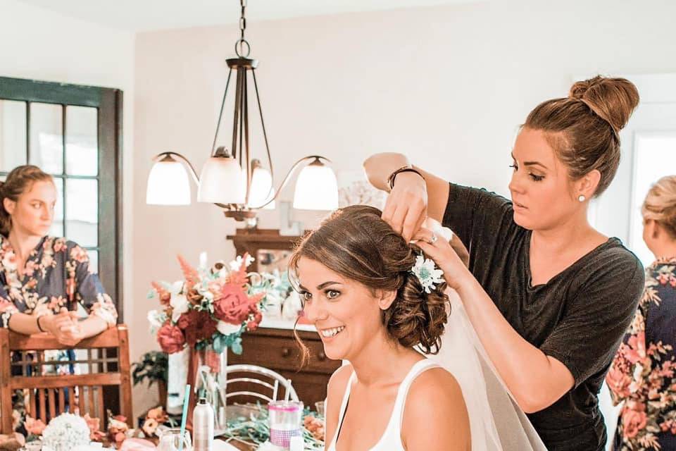 Finishing touches on bride