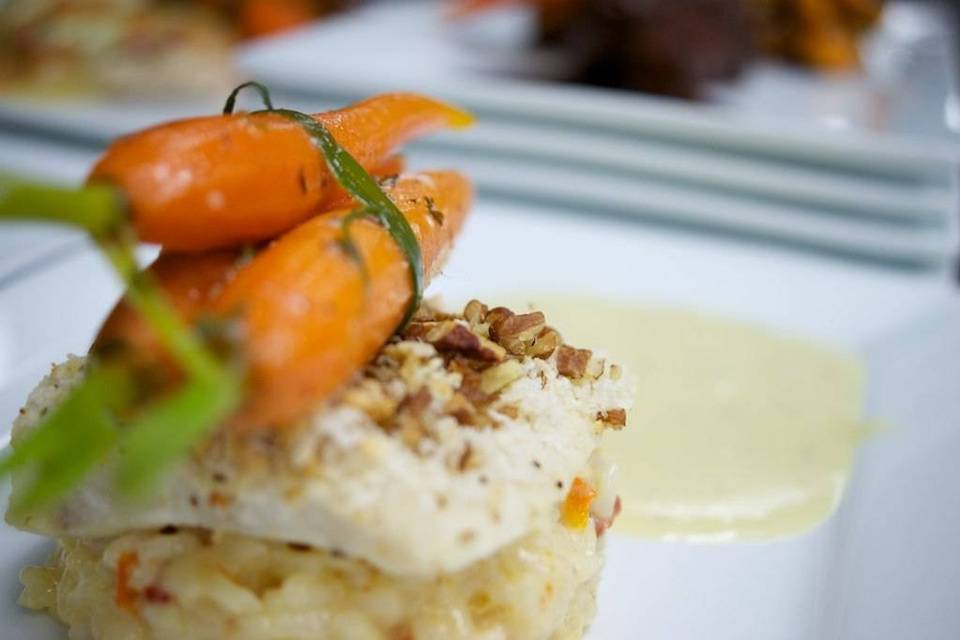 Pecan crusted halibut with beurre blanc over sundried tomato risotto