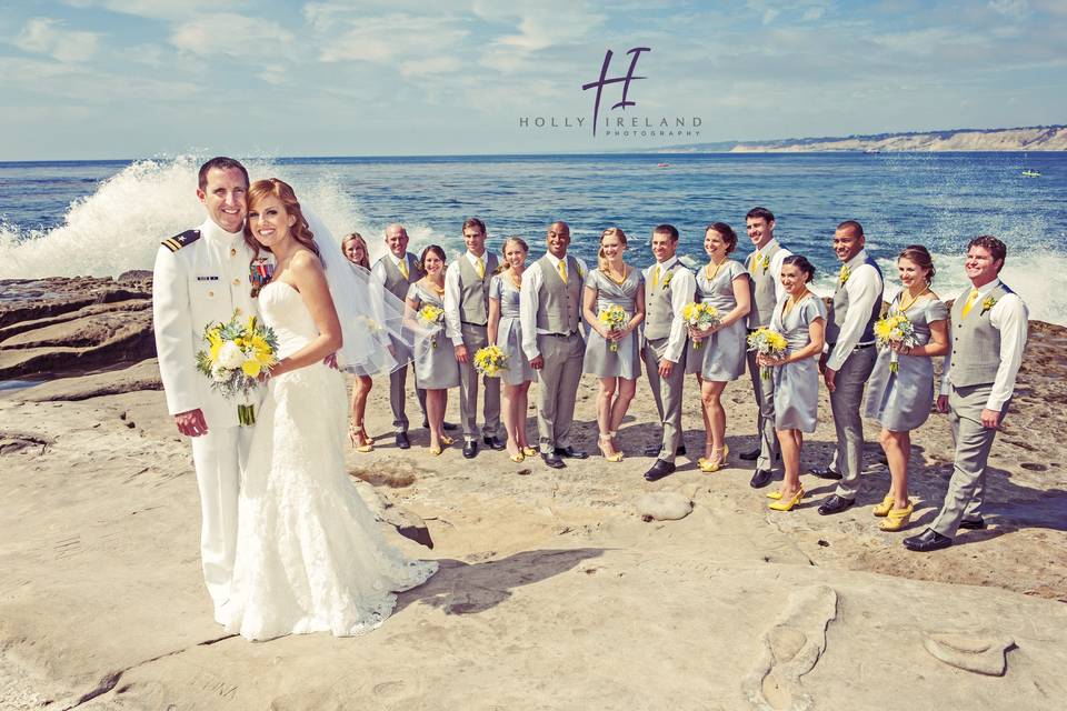 The couple with the bridesmaids and groomsmen