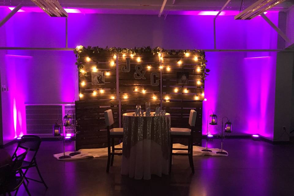 Rustic backdrops and pink uplights