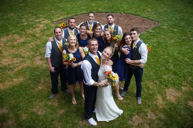 The couple with the bridesmaids and groomsmen