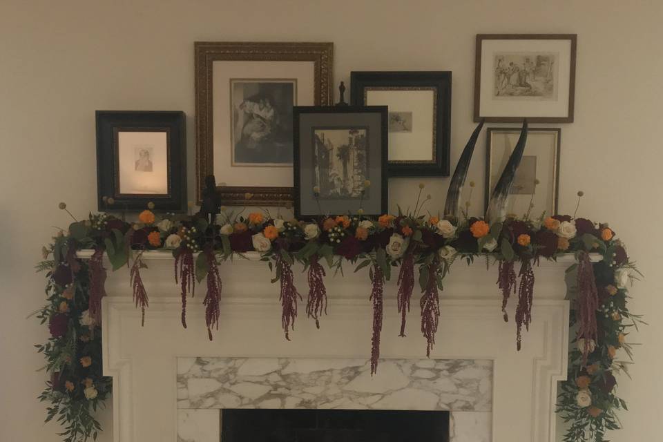 Fireplace with floral garland
Stephenville Wedding