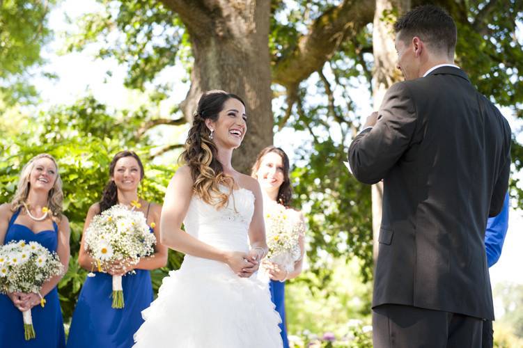 Bride laughing a some great wedding vows