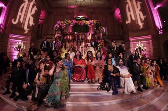 Guest of a Valima celebration take in the party on the steps of the Rotunda at San Francisco's City Hall.