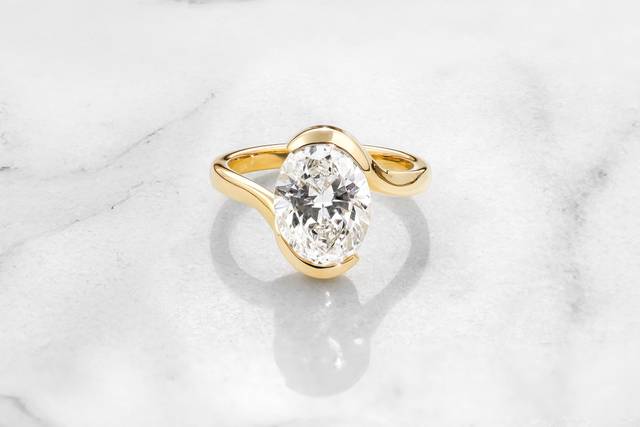 oval-diamond-14k-yellow-gold-engagement-ring3.jpg