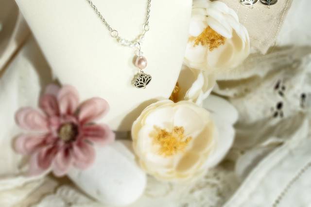 Mauve, lotus charm