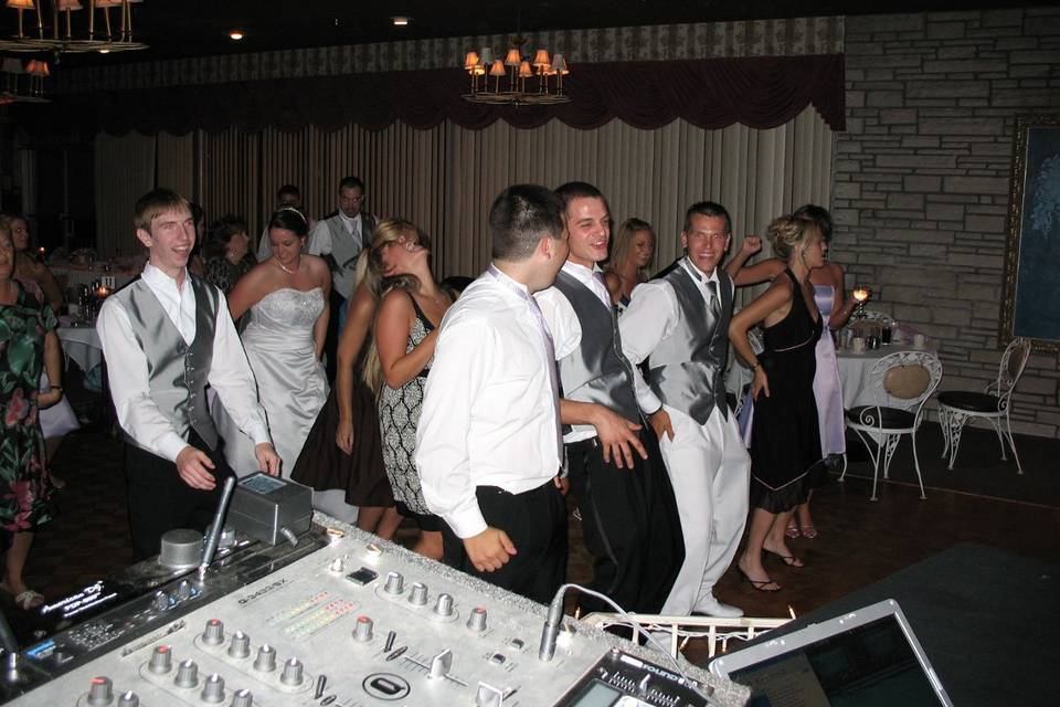 Bridal party dancing