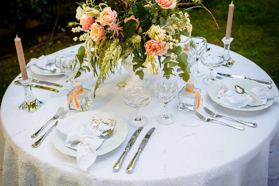 Round table decoration in a garden set up