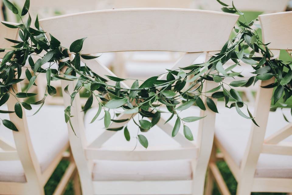 Wedding chair with olive leaf garland
