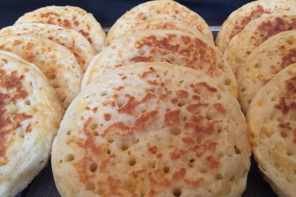 CHEDDAR-CHEESE CRUMPETS
We've all herd of tea & crumpets, how about crumpets & eggs, cheese & crumpets, crumpet pizza and open faced sandwiches....
Our crumpets are an impressive 4 inches, where others struggle to reach 3.75, they are lightly crunchy on the outside, chewy on the inside and oh sooo delicious!
...And are available in 3 Flavors, Traditional, Cheddar-Cheese, Parmesan & Cracked Pepper. They arrive in a lovely black box with hand-tied ribbon, treat yourself or treat a friend...Stewart's, Where Taste Meets Quality.