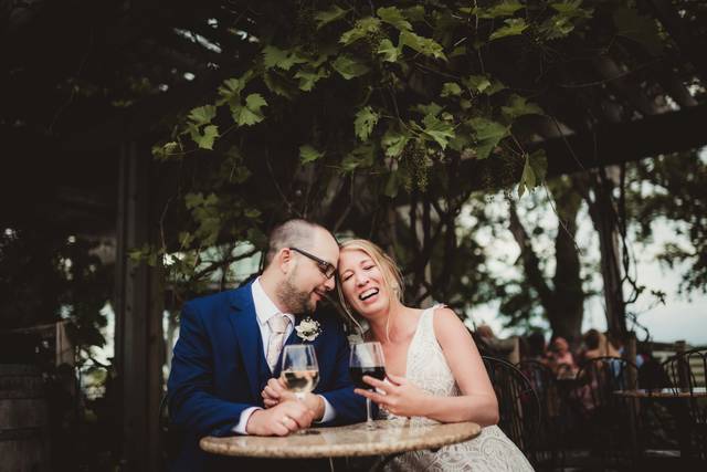 Laughing together over glasses of wine