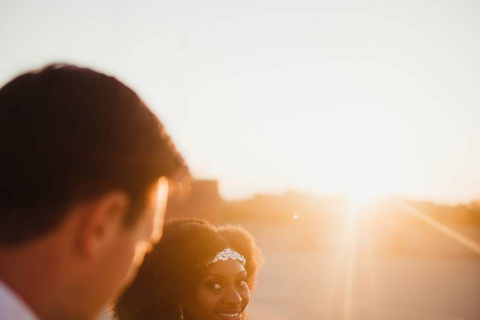 Newlyweds at sunset