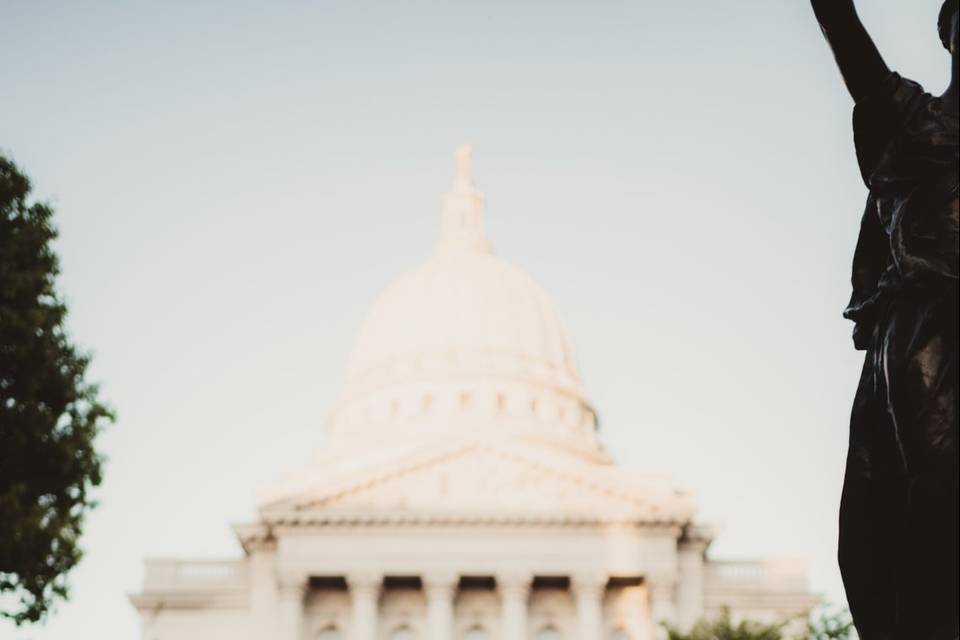 Newlyweds in front of the Wisconsin Capitol