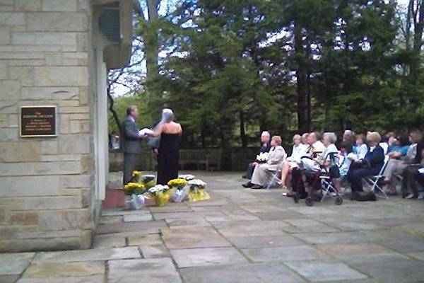 Rev. Wayne Doberstyn officiating at Holly and Jimmy's wedding.