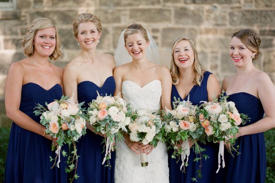 Happy bride with bridesmaids