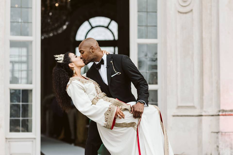 Bride and groom kiss