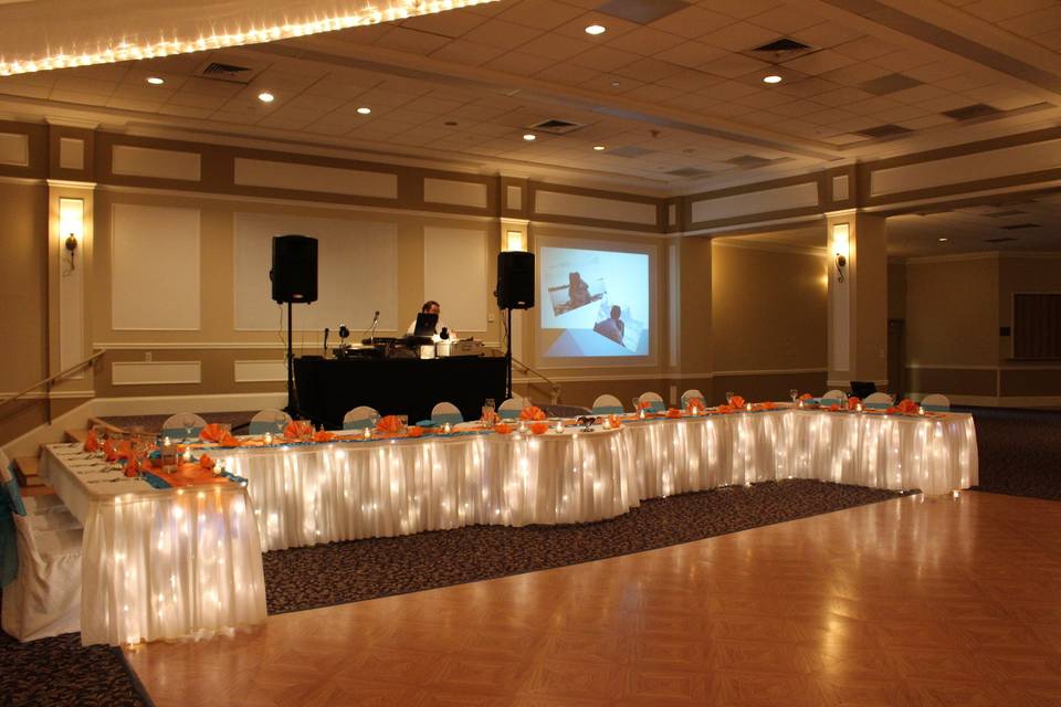 Long white table with lights