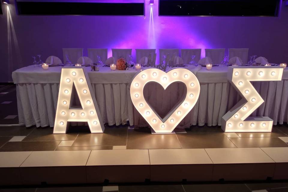 Wedding letters in front of reception table