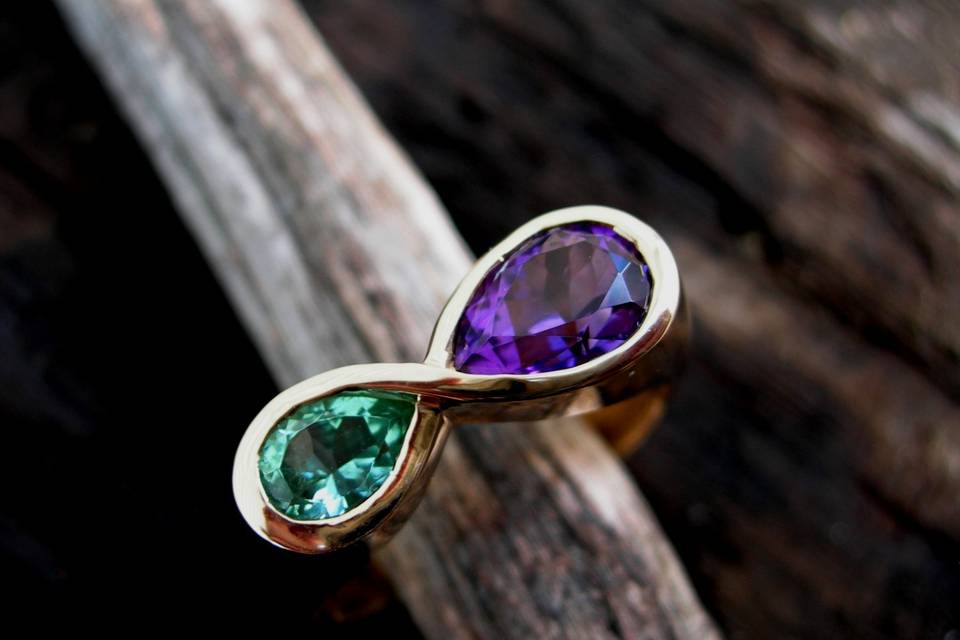 Maine Tourmaline-Amethyst infinity ring. For more jewelry go to www.creaserjewelers.com.
Find us and like us on Facebook and Pinterest.