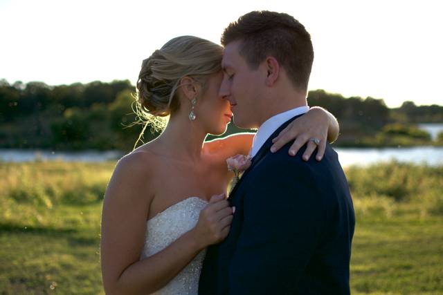 Couple hugging at sunset