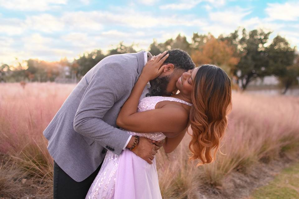 Romantic kiss during sunset