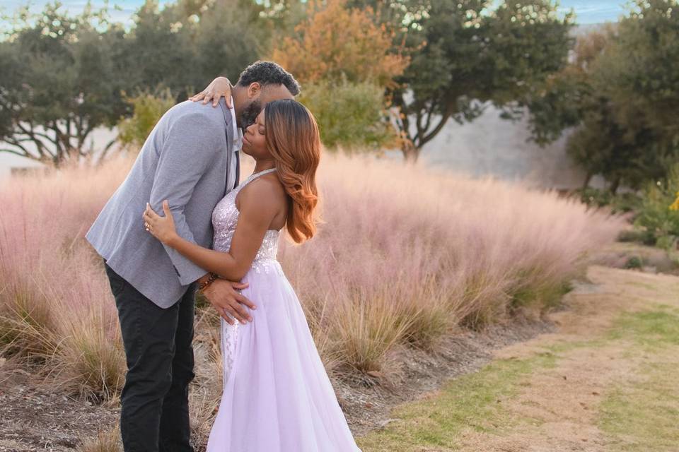 Groom whispering to bride