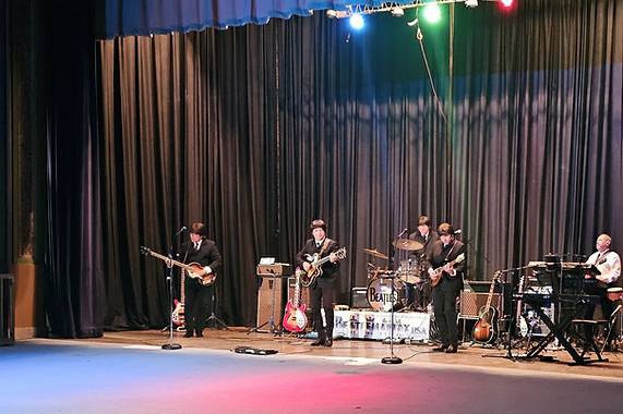 BeatleManiax perform in Audito