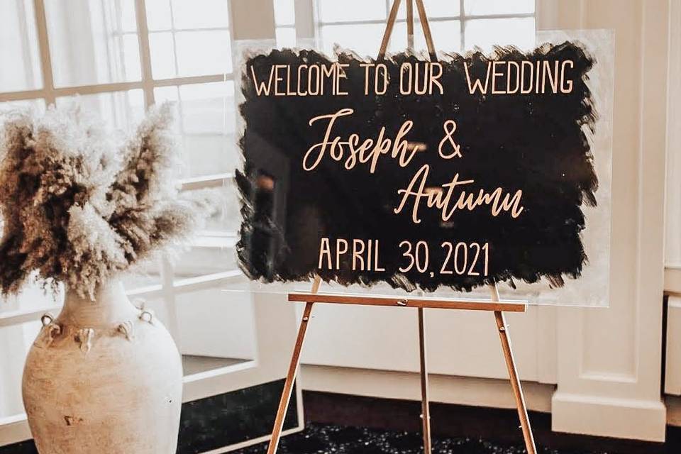 Welcoming guests with custom sign