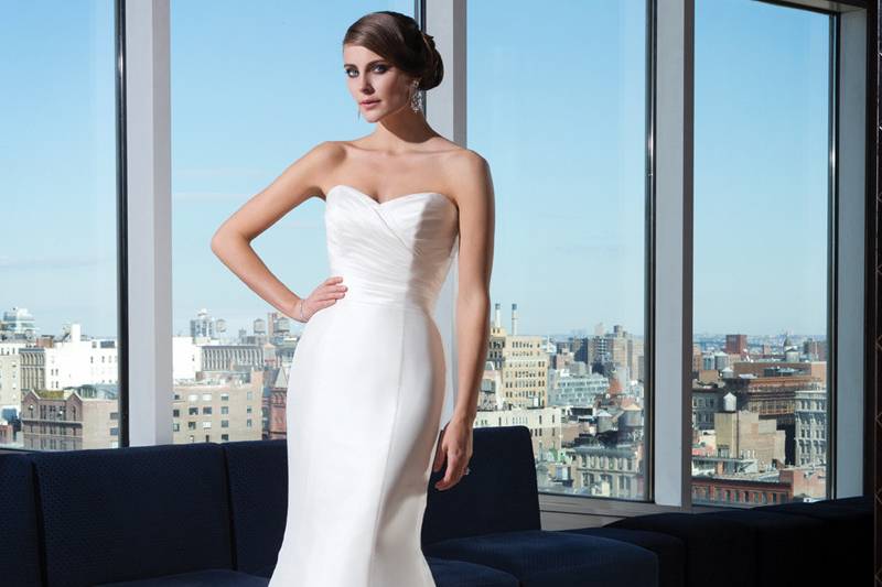 Style 9795 <br> Beaded tulle ball gown embellished with a sabrina neckline.