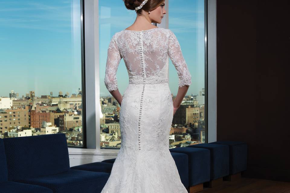 9864		Liquid beading and crystals adorn this voluminous ball gown with a V-neckline, beaded straps, natural waist, and geometric printed organza skirt with a cathedral length train. Available with a plain organza skirt as style 9864A.