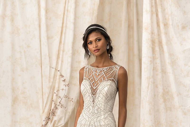 Justin Alexander Signature	9897	<br>	Geometrical hand beading adorns the plunging Sabrina neckline. Stretch Jersey fully lines this luxurious fit and flare. Hand beading adorns the illusion square cut back with button and loop closures.