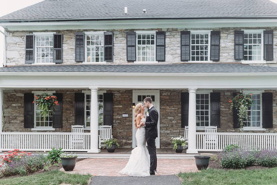 In front of the Mansion