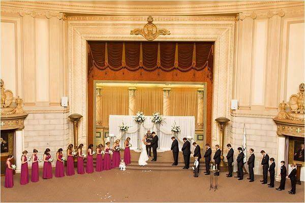 The couple with the bridesmaids and groomsmen