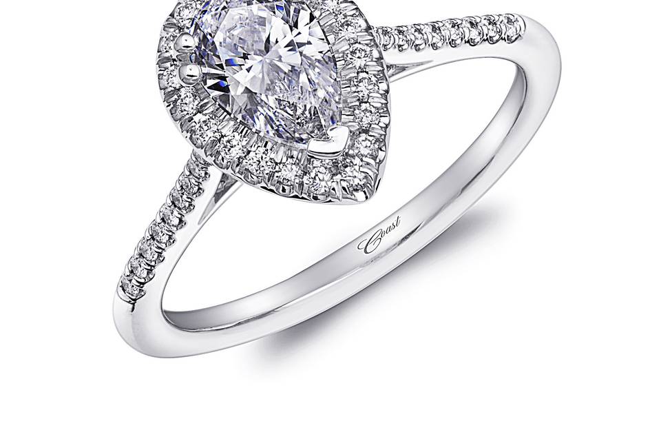 Style Engagement Ring (LC5410-PRS) <br>	This stunning pear shaped ring is surrounded by a graceful diamond halo. Diamonds decorate the shoulders of the ring. Set in 14k white gold and shown with a one carat center stone. Available in center stone of your choice.