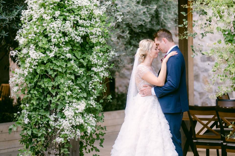 Couple under arbor