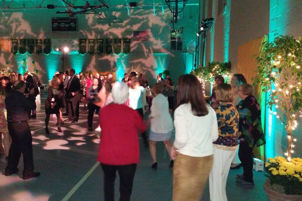 Multi-year reunion - dancers from graduating classes spanning the decades find common ground on the dance floor!