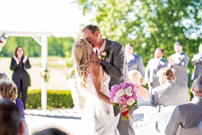 Aisle Kiss on Patio - Summer