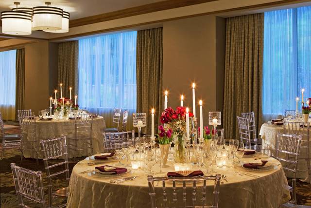 Table setup with floral and candle centerpiece