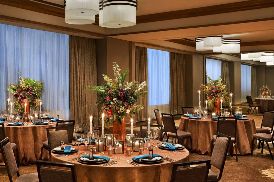 Table setup with floral and candle centerpiece