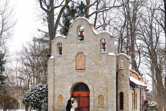 Couple at Lourde's College Chapel. Winter wedding