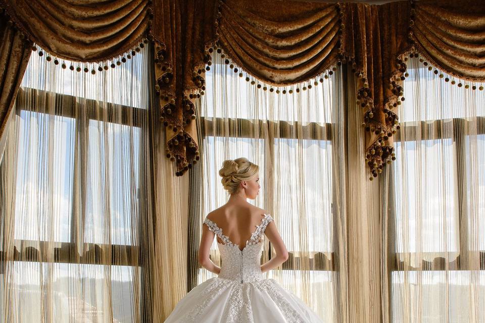 Bride looking out the window