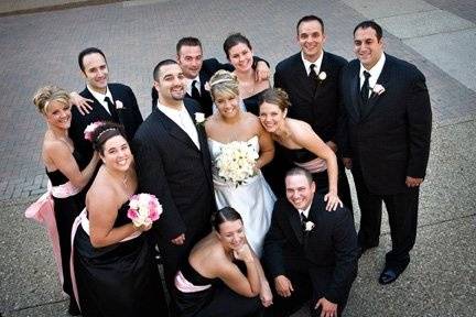 The couple with the bridesmaids and groomsmen