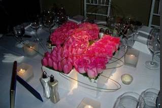 Table setting with flowers as centerpiece