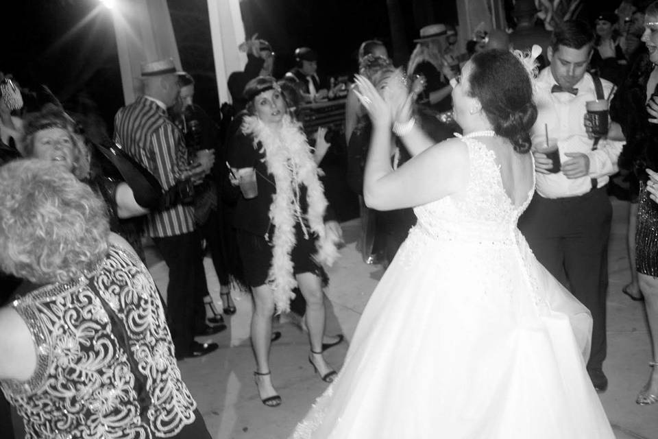 Newlyweds and guests on the dance floor