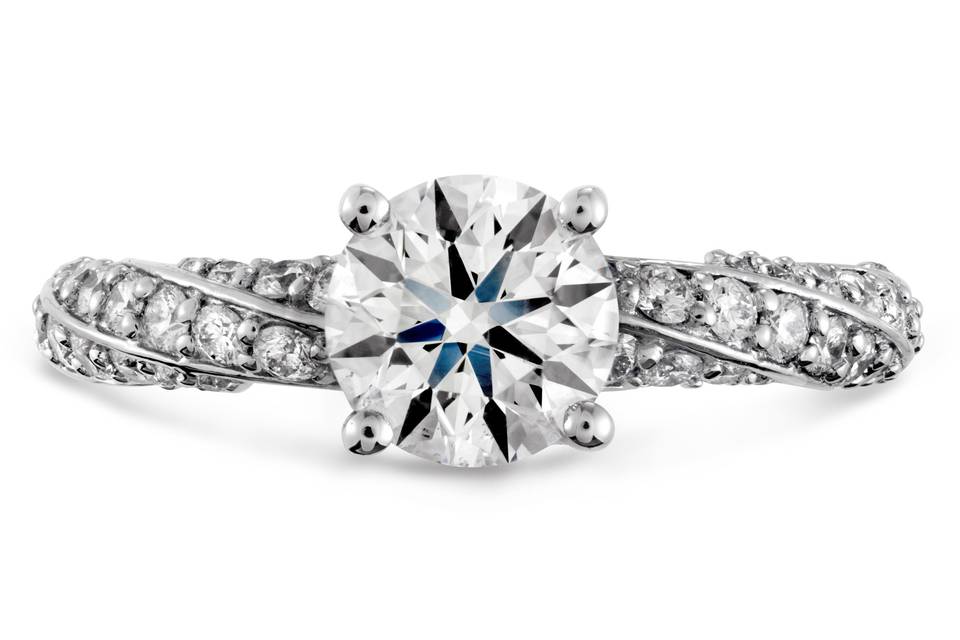 Atlantico Pave Engagement Ring<br>
This eye-catching engagement ring brings the Atlantico Solitaire Engagement Ring to the next level by coating the band in perfectly cut diamonds, thus creating a dazzling backdrop for the center stone to sparkle. The perfect ring for a woman wanting a ring that truly stands out from the crowd.