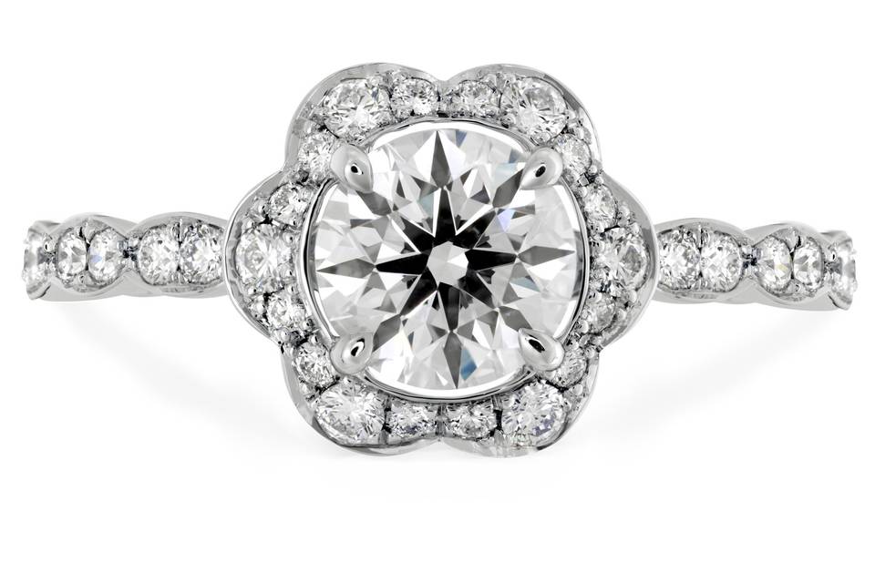 Lorelei Floral Engagement Ring<br>
The floral design and intricate details of this beautiful engagement ring put it in a league of its own. The signature scalloped edges of the Lorelei Collection are on full display on this stunner. It’s the perfect ring for a woman who wants a ring that is bold yet feminine.