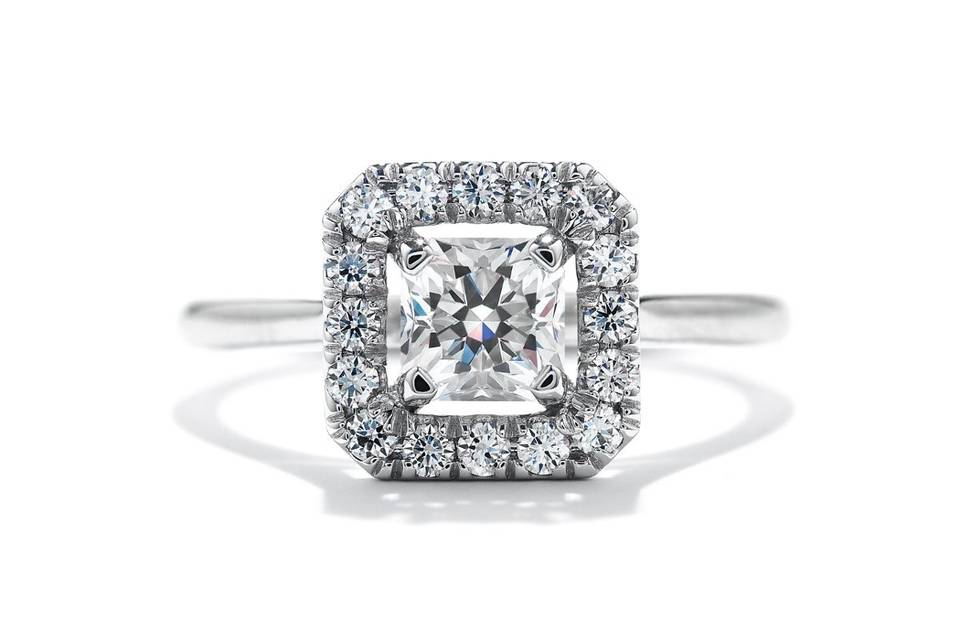 <b>Repertoire Select Dream Engagement Ring</b><br>
An exquisite frame of Hearts On Fire diamonds delicately encircles Dream diamond in this ethereal design. Available in platinum or 18K white gold.</br>